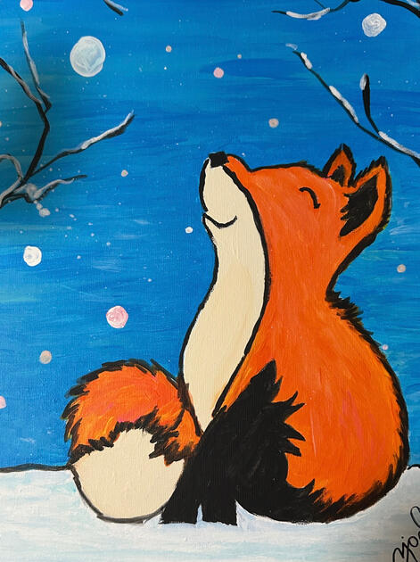 A bluebird sky with white puffy snow is the backdrop for a cute orange and fox who smiles up at the snow above him.