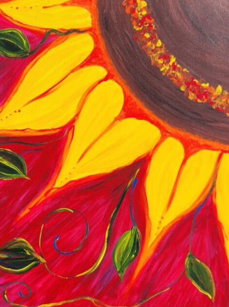 Bright, happy red background with green vines and vivid yellow petals surrounding the brown center of a sunflower.